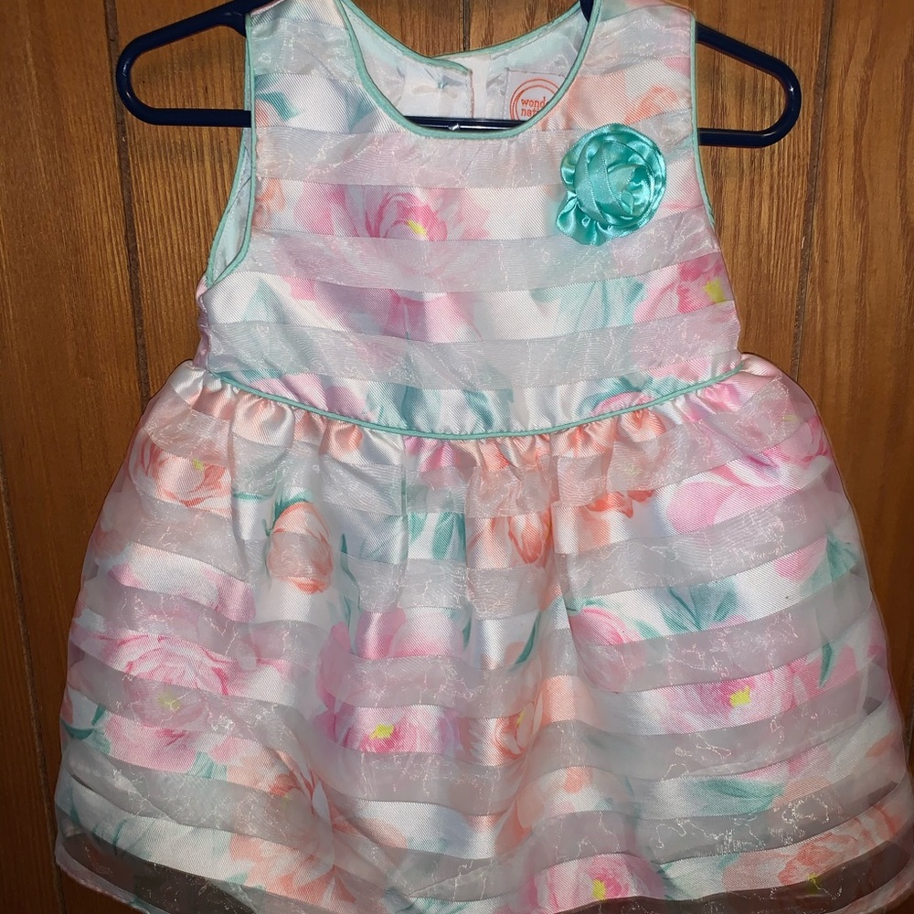 Little girl satiny dress.